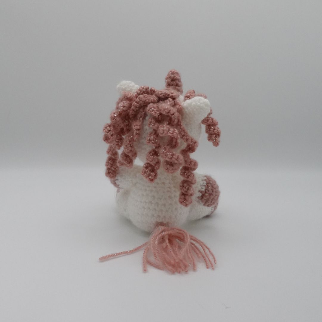 Licorne boucles pailletées