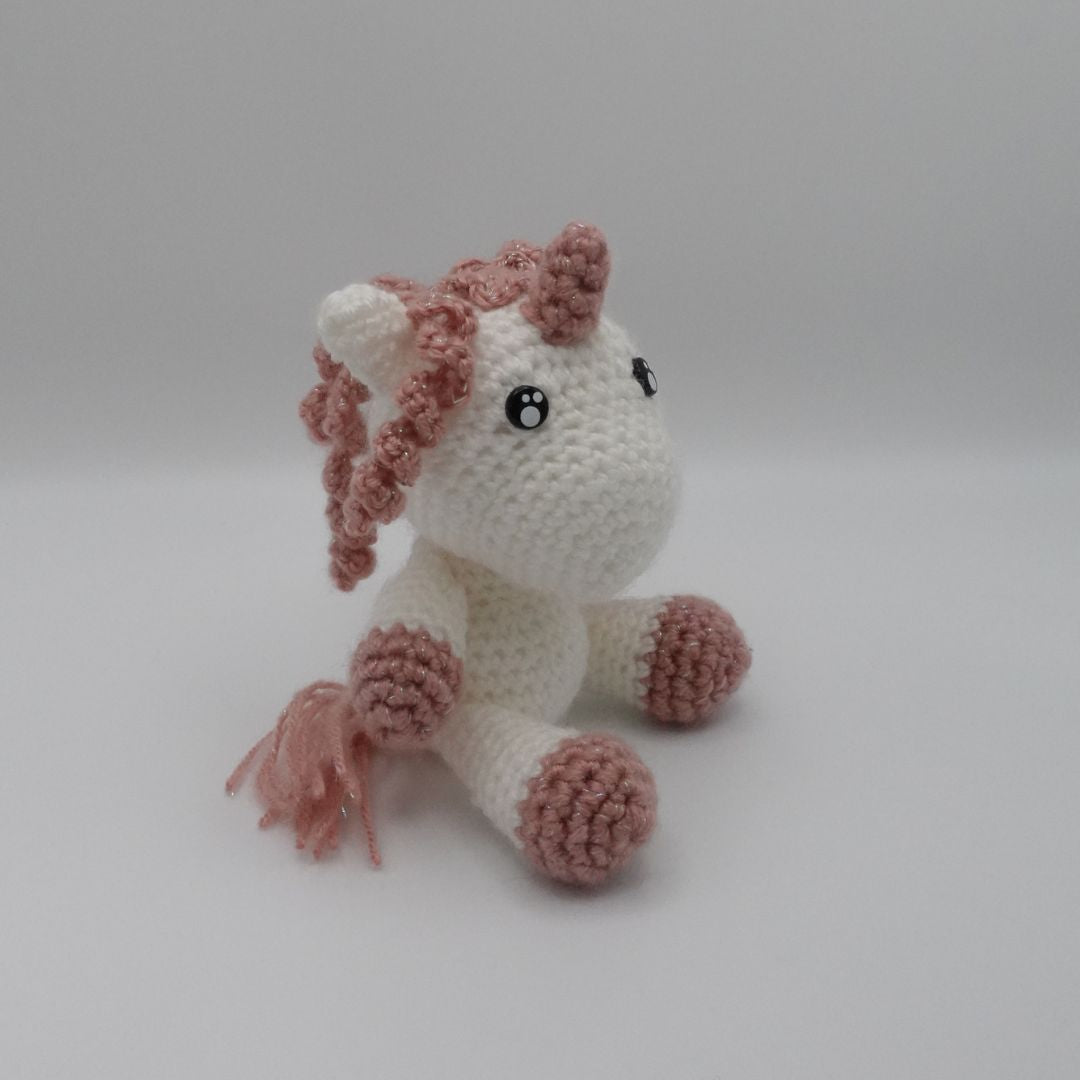 Licorne boucles pailletées